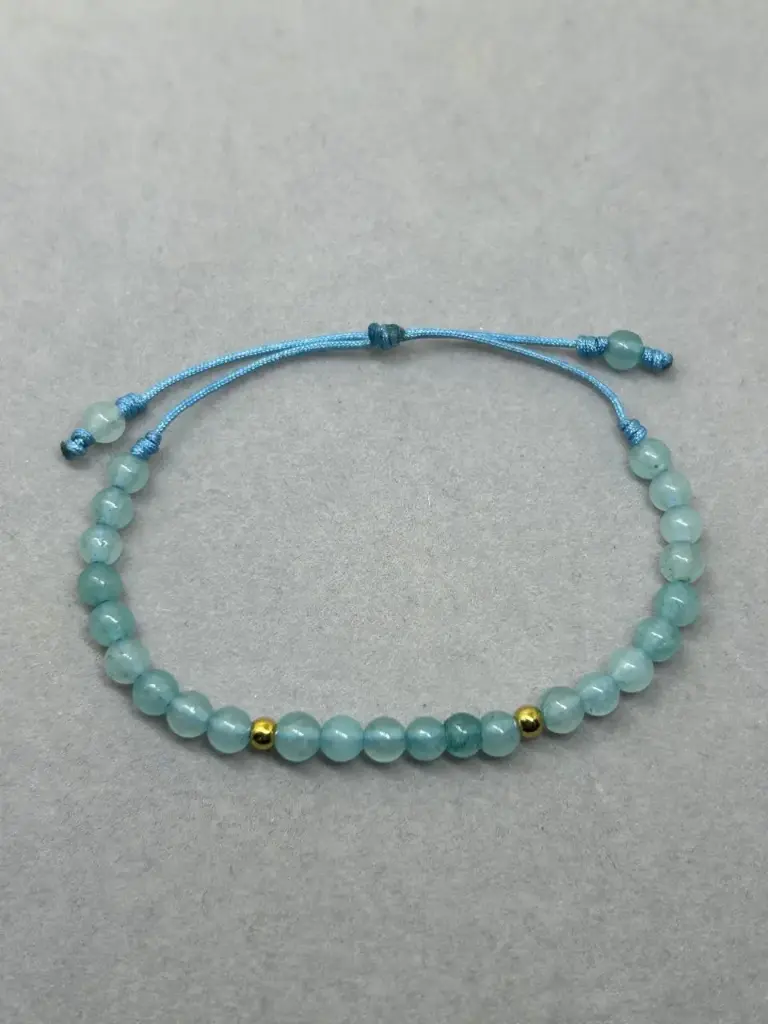 PULSERA DE HILO AGUAMARINA