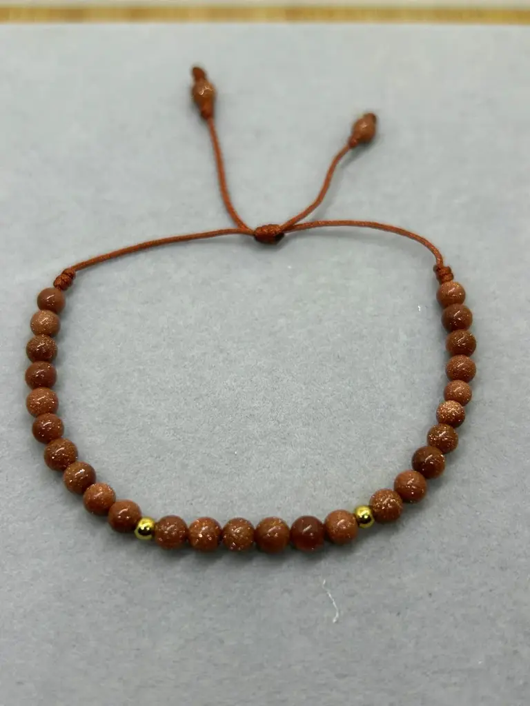 PULSERA AB LLUVIA DE ORO